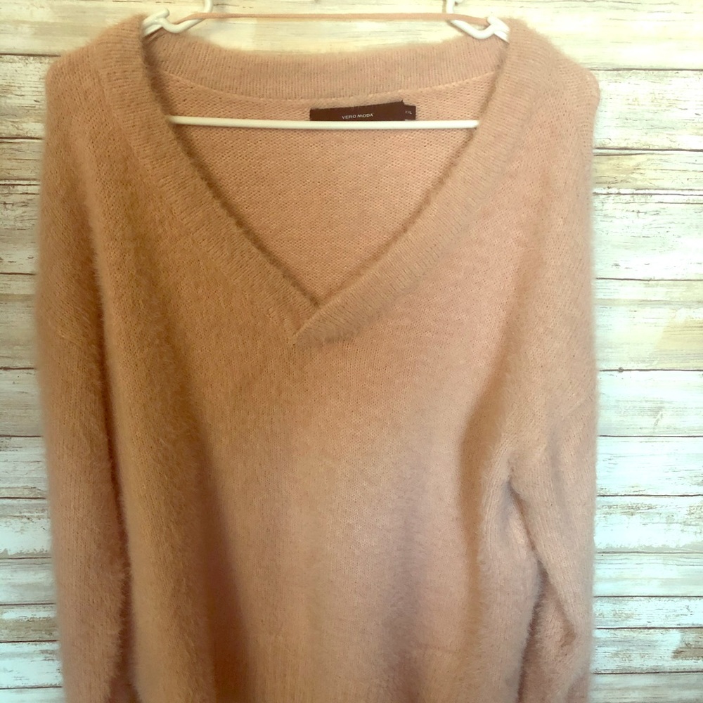 Pink fuzzy, soft sweater. V neck.